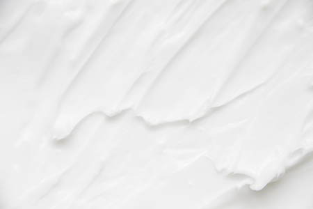 Cosmetics. Cream white background texture.の写真素材