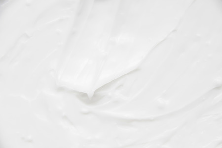 Cosmetics. Cream white background texture.の写真素材