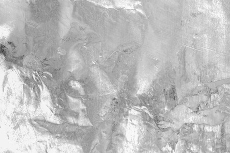 Shiny silver white grey gray paper foil decorative texture background: Bright brilliant festive glossy metallic look textured backdrop: Metal steel like material pattern surface for design decorationの写真素材