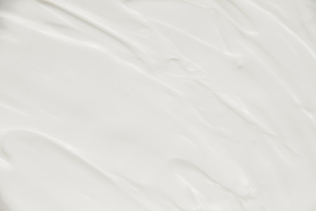 Cosmetics. Cream white background texture.の写真素材