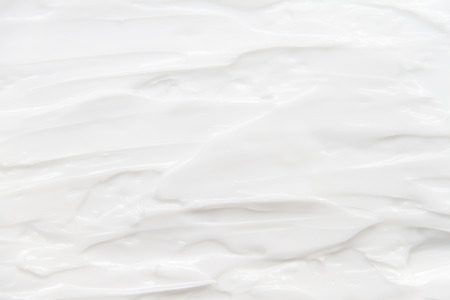 Cosmetics. Cream white background texture.の写真素材