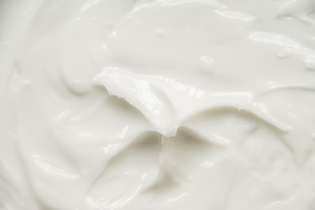 Cosmetics. Cream white background texture.の写真素材