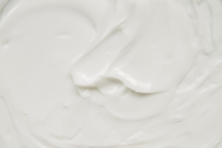 Cosmetics. Cream white background texture.の写真素材