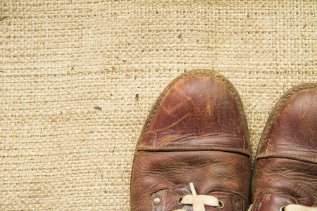 Brown leather shoes on the sacks.の写真素材