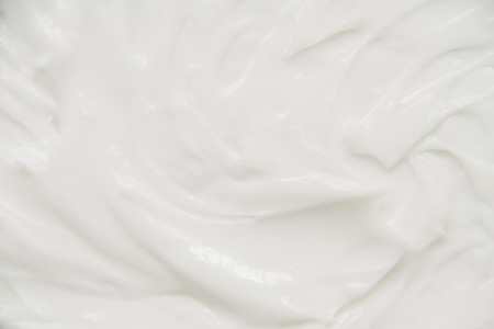 Cosmetics. Cream white background texture.の写真素材