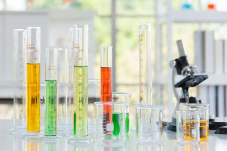 Chemical reagent bottles in scientific experiment bottles of different shapes and sizesの写真素材