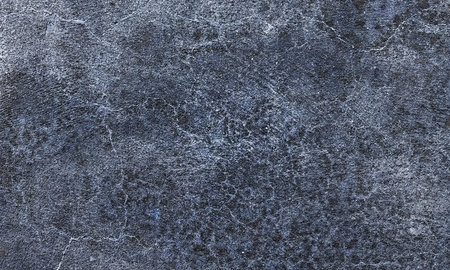Dark blue textured background. Close-up image of the surface of the stone.の写真素材