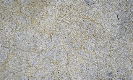 Texture of old grunge rustic wall covered with gray stuccoの写真素材