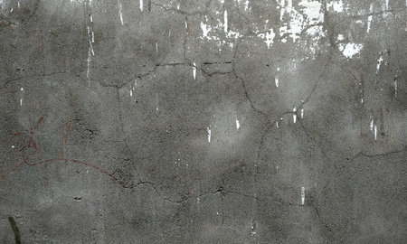 Texture of old grunge rustic wall covered with gray stuccoの写真素材