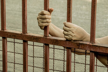 Hand in jailの写真素材
