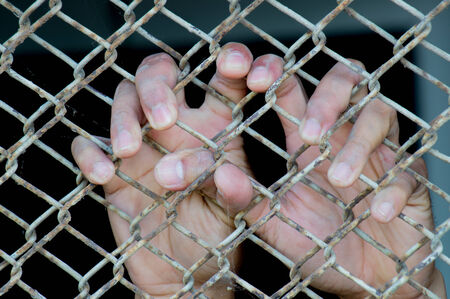 Hand in jailの写真素材