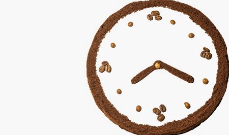 watch made from grain and ground coffee on a white background
