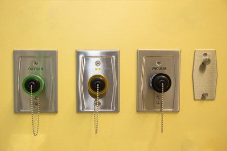 oxygen air and  vacuum equipment panel sign in ICU at hospitalの写真素材
