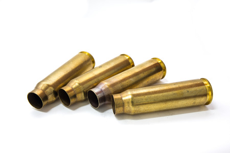 20 mm cartridges cases of aircraft cannon isolated on white backgroundの写真素材
