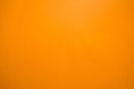 clear and clean dark orange wall for texture and backgroundの写真素材