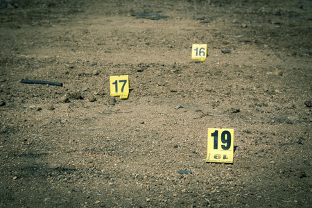 group of evidence marker number in crime scene investigation in cinematic toneの写真素材