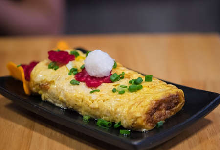 Tamagoyaki in night cafe japanese restaurantの写真素材