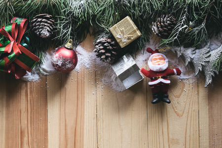 Christmas background with decorations on wood background, top view and vintage effect.の写真素材