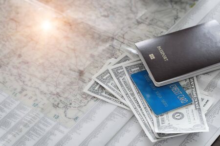 above International travel concept. Passport, money, credit card and map vintage toneの写真素材