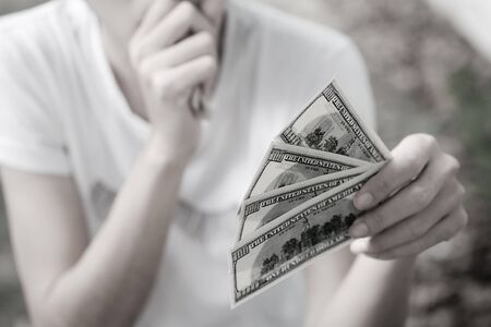 Human trafficking concept,A lady boy hand holding a money with vintage tone.の写真素材