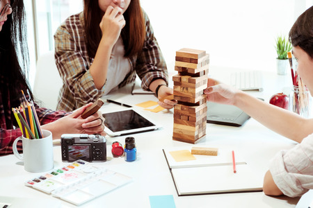 Creative team meeting and play a game on meeting room,activity in office for harmonious.の写真素材
