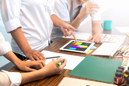 Creative team planning and meeting select color for working designer team concept.の写真素材