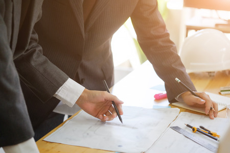 Two business Engineer discussing meeting architectural project working.の写真素材