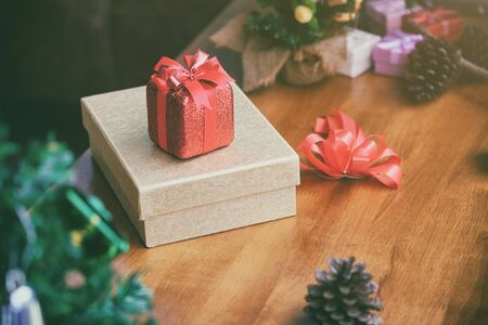 merry christmas gift box a box on wooden desk with vintage tone