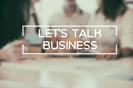 Let's Talk Business word on meeting of business on blur background.の写真素材
