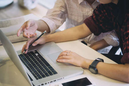 architecture engineer discussion with laptop computer in meeting.