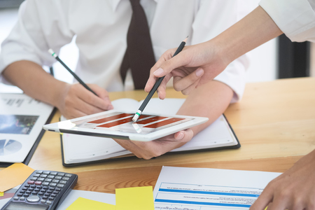 Startup business concept,businessman consult meeting or brainstorming to start new business.の写真素材
