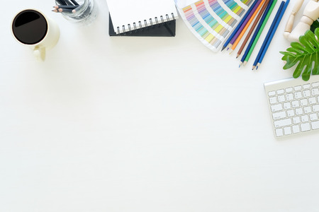 Top view artist workplace with computer and office supplies.の写真素材