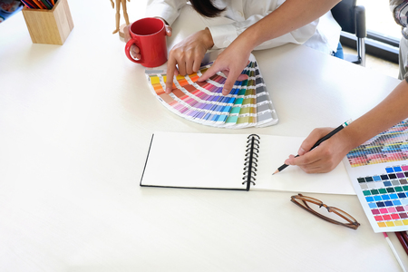 Graphic designer meeting with closeup shot photo.の写真素材