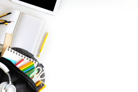 Back to school. Items for the school colourful supplies on white table ready for your designの写真素材
