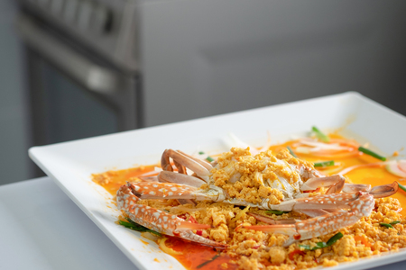 Crab with curry on dish.の写真素材