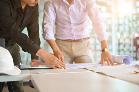 Architectural. concept, Engineer meeting working with partner on workplace.の写真素材