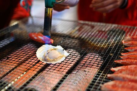 Street food Japan, Burning of seafood.の写真素材