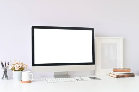 Workspace table office supplies on creative workplace with mockup computer empty display.の写真素材