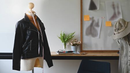 Mannequin dummy model on fashion designer workspace.