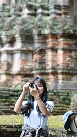 Young woman take a picture with travel holiday concept.の写真素材