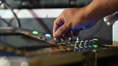 Audio sound mixer console with night time.