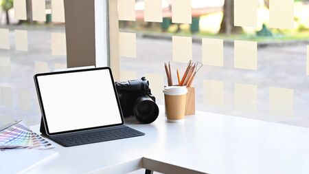 Mockup tablet on Creative workspace.の写真素材