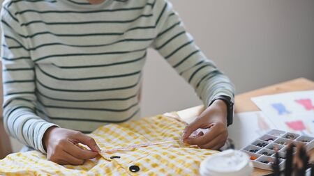 Cropped shot female designer working her project.の写真素材