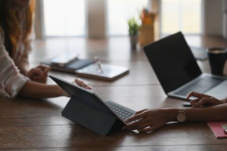 Cropped image of Business development team while meeting/designing about their business plan at the...