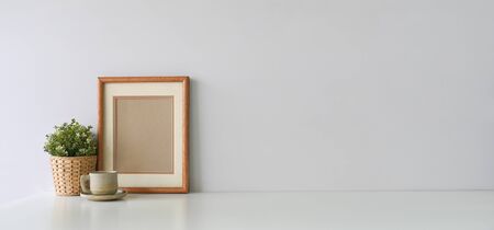 A comfortable workspace is surrounding by office equipment.の写真素材