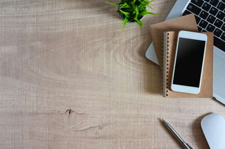 A beautiful woman is using a computer tablet and stylus pen while sitting in the meeting room.の写真素材