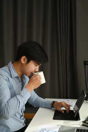 Cropped shot of man secretary checking mail on netbook organizing working process in office