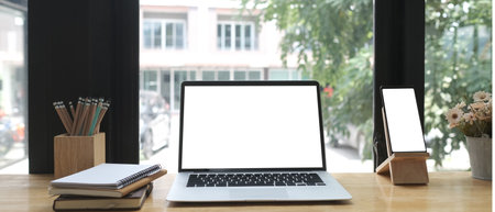 Close up view of male graphic designer or photo editor working on digital tablet in studio office.の写真素材