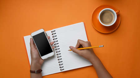 Young woman using computer  laptop and digital tablet making online payment or shopping online.の写真素材