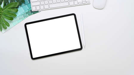 Top view of mock up smear phone and digital tablet with blank screen on black leather.の写真素材